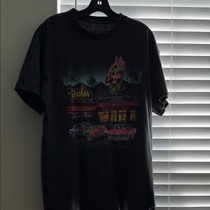 Vintage Black Graphic Tee with Retro Design